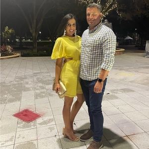 Shine bright in this yellow cutout dress!